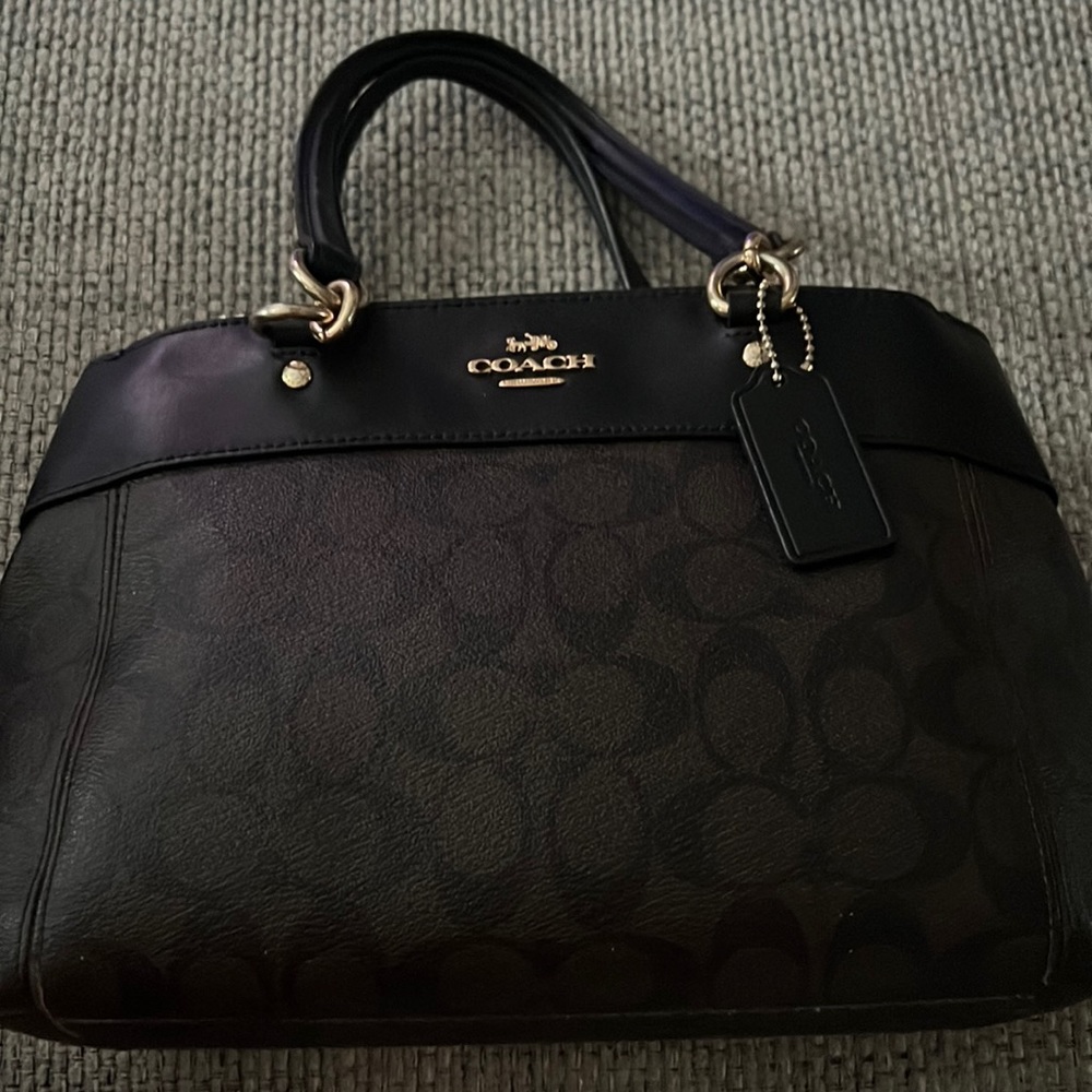Authentic COACH, BARELY used, very clean. 3 compartment, inside pocket slots.